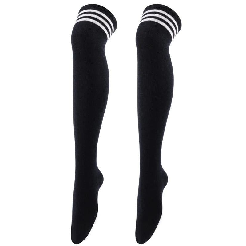 Calcetines altos de mujer en color negro con rayas blancas
